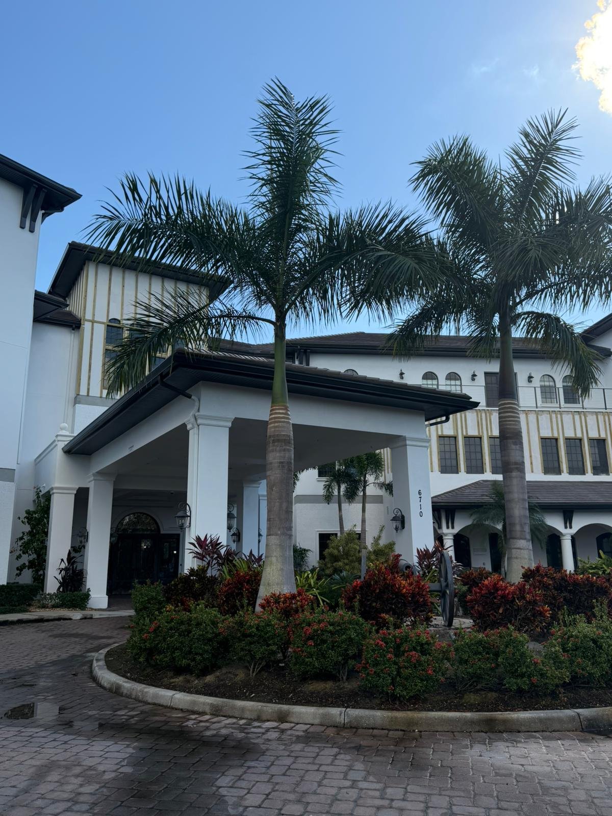 Professional black gutter and fascia installation on a commercial building in Southeast Florida